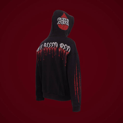 Three-quarter view of the ABR 001 “BLOODSTONES” hoodie with rhinestone hood emblem and sleeve detailing